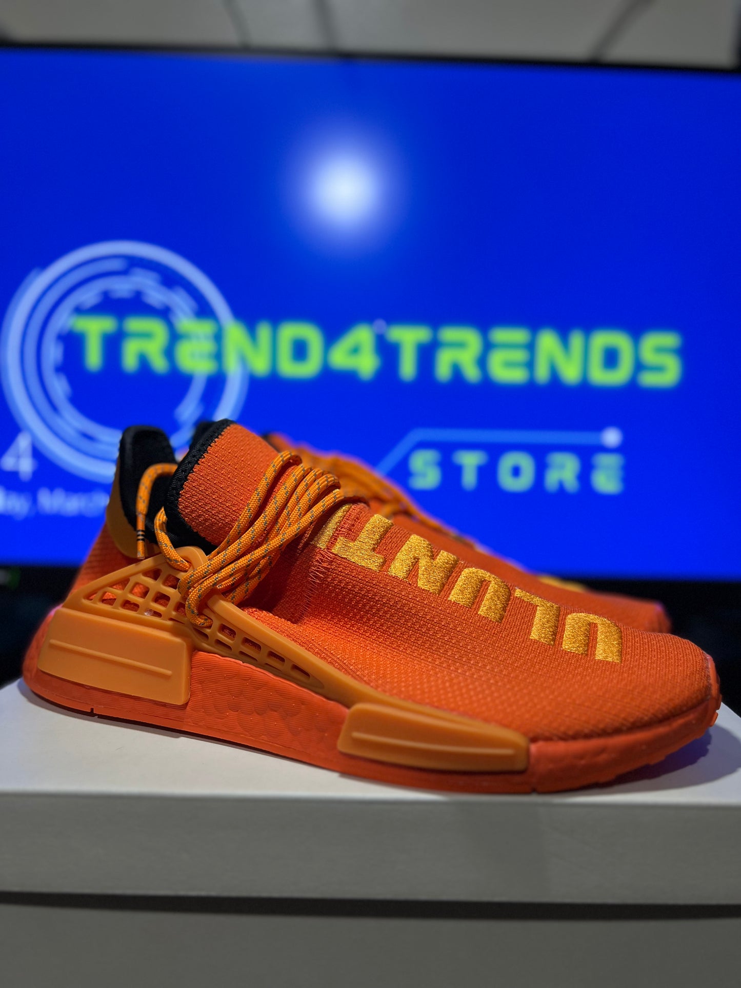 Size 10M/11.5W - Adidas NMD Hu Pharrell Orange 2022