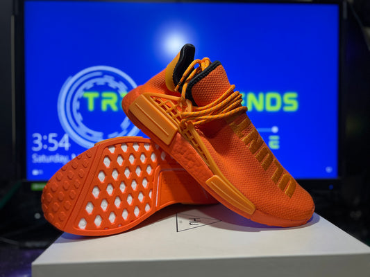 Size 10M/11.5W - Adidas NMD Hu Pharrell Orange 2022